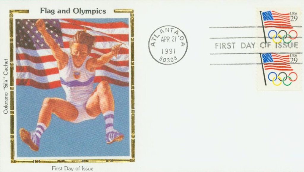 #2528 - 1991 29c Flag and Olympic Rings Colorano Silk Cachet First Day Cover